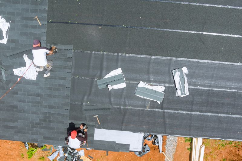 Local Asphalt Roof Installation pros at work